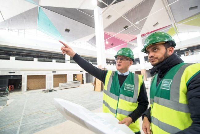 Cllr Malcolm Kennedy, left, inspecting work on the new look St John's Market